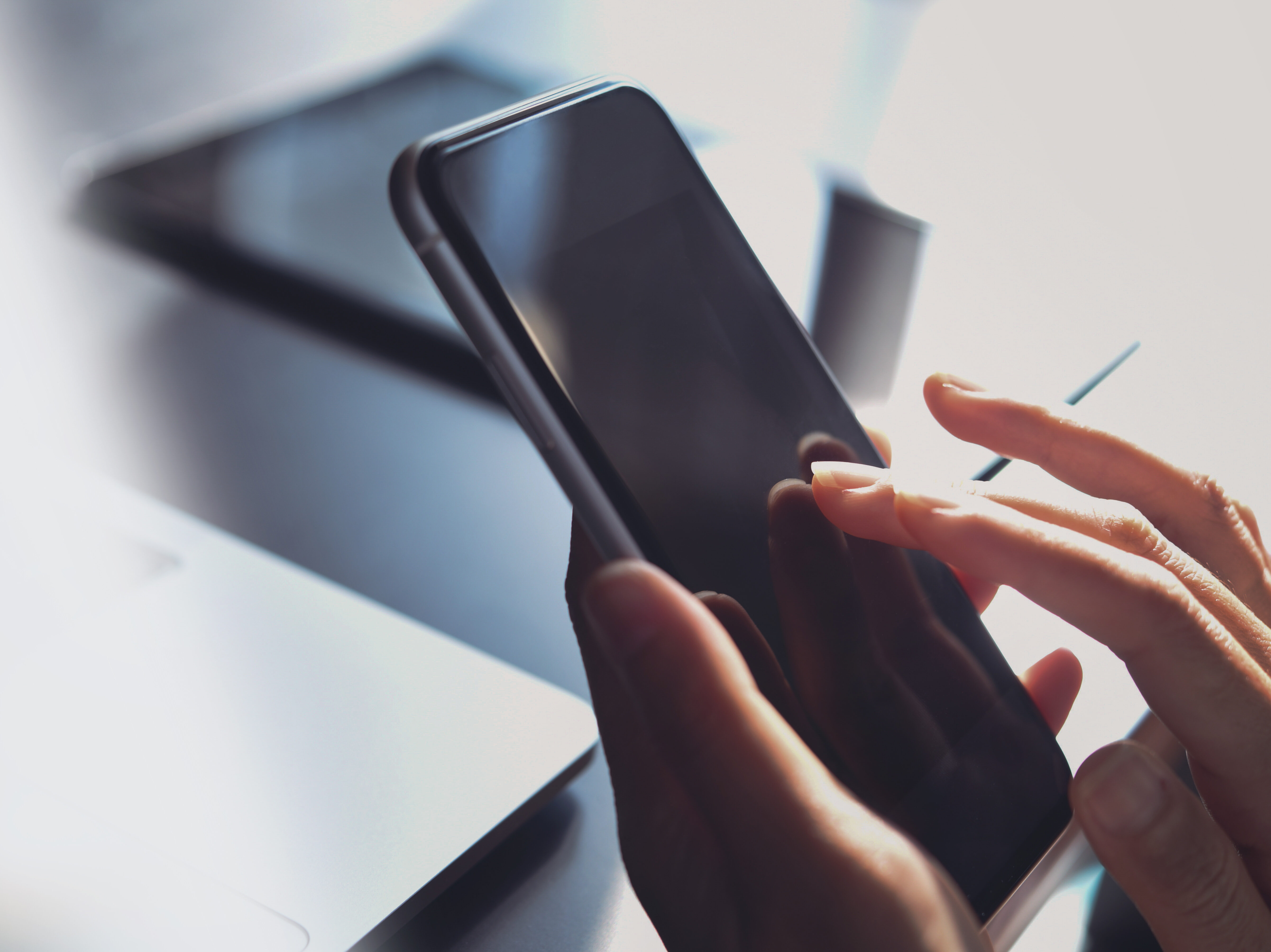 Close-up, business woman using smartphone, touching on screen, s
